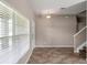 Bright living room with tiled floors, neutral paint and a large window with natural light at 512 Bella Rosa Cir, Sanford, FL 32771