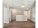 Upstairs loft with multiple doorways, ceiling lighting and wood floors at 512 Bella Rosa Cir, Sanford, FL 32771