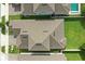 Bird's eye view shows the property with well-maintained roofing, landscaping, and driveway at 5314 Golden Apple Dr, Winter Garden, FL 34787