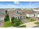Neighborhood aerial view showcasing the home's location in a residential area with well-maintained lawns and streets at 5314 Golden Apple Dr, Winter Garden, FL 34787