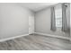 The bedroom showcases modern gray floors and trim, enhancing its contemporary style at 5314 Golden Apple Dr, Winter Garden, FL 34787