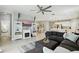 Bright living space showcasing tile floors, a gray sofa, open floor plan and views of the dining area at 5314 Golden Apple Dr, Winter Garden, FL 34787
