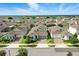 A street view capturing the well-manicured front yards and charming exteriors of homes in a residential neighborhood at 5314 Golden Apple Dr, Winter Garden, FL 34787