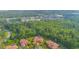 Aerial view showcases the home's prime location amid lush greenery and upscale neighborhoods at 5413 Via Veneto Ct, Sanford, FL 32771