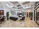 Comfortable living room with fireplace, built-in shelves, and recessed lighting at 5413 Via Veneto Ct, Sanford, FL 32771