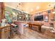 Entertainment area with a brick bar, pool table, and multiple wall decorations, creating a fun atmosphere at 5413 Via Veneto Ct, Sanford, FL 32771
