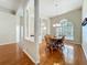 Cozy dining room showcasing a round table with chairs, chandelier and natural light at 5489 Glen Oak Place, Sanford, FL 32771