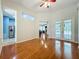 Open-concept home featuring gleaming hardwood floors and bright, inviting spaces at 5489 Glen Oak Place, Sanford, FL 32771