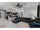 Open-concept layout with seamless integration of the kitchen, dining area, and living room at 654 Star Magnolia Dr, Kissimmee, FL 34744