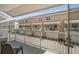 Charming balcony provides an inviting view of the exterior, with manicured landscaping, and neighboring townhome buildings at 661 Hangnest Ln, Lake Mary, FL 32746