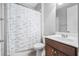 Bathroom featuring a shower with curtain and a single sink at 661 Hangnest Ln, Lake Mary, FL 32746