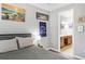 Comfortable bedroom with a Penn State theme, carpet, and en-suite bath at 661 Hangnest Ln, Lake Mary, FL 32746