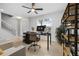 Well-lit office space with neutral walls, modern desk, shelves, and a comfortable chair at 661 Hangnest Ln, Lake Mary, FL 32746