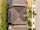Overhead view of the home with dark tile roof at 8066 Ludington Cir, Orlando, FL 32836