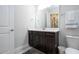 Bathroom featuring a modern vanity with dark wood cabinetry and tile flooring at 8066 Ludington Cir, Orlando, FL 32836