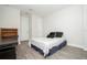 Functional bedroom with ample workspace, storage, and laminate flooring at 8066 Ludington Cir, Orlando, FL 32836