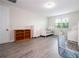 Open concept bedroom with modern decor featuring two twin beds and a desk at 8066 Ludington Cir, Orlando, FL 32836
