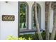 Close-up showcasing the architectural details, including arched windows and the address number 8066 at 8066 Ludington Cir, Orlando, FL 32836