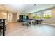 Spacious game room featuring ping pong and pool tables, large windows, and recessed lighting at 8066 Ludington Cir, Orlando, FL 32836