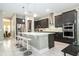 Contemporary kitchen with a large island, stainless steel appliances, and plenty of counter space at 8066 Ludington Cir, Orlando, FL 32836