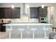 Stylish kitchen with modern appliances, a spacious island, and pendant lighting at 8066 Ludington Cir, Orlando, FL 32836