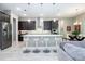 Modern kitchen featuring a center island, stainless steel appliances, and an open design at 8066 Ludington Cir, Orlando, FL 32836
