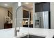 A modern kitchen sink with a gray goose neck faucet and white countertops at 8066 Ludington Cir, Orlando, FL 32836