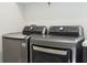 Close up on new, modern LG laundry machines in a well-lit laundry room at 8066 Ludington Cir, Orlando, FL 32836