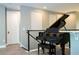Second-floor loft area with a piano and wet bar area at 8066 Ludington Cir, Orlando, FL 32836