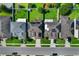 This aerial view shows the property and neighborhood homes, featuring well-maintained lawns and driveways at 965 Maypole Dr, Apopka, FL 32703