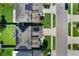 This aerial view shows the property and neighborhood homes, featuring well-maintained lawns and driveways at 965 Maypole Dr, Apopka, FL 32703