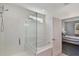 This bathroom features a shower, soaking tub, and a view into the bedroom at 965 Maypole Dr, Apopka, FL 32703