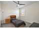 Bright bedroom with carpet, ceiling fan, and natural light from the window at 965 Maypole Dr, Apopka, FL 32703