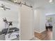 Workout room with a ceiling fan and a sliding barn door at 965 Maypole Dr, Apopka, FL 32703