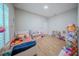 Bright bedroom with a light wood floor and natural light at 9863 Summerlake Groves St, Winter Garden, FL 34787