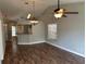 Spacious living area featuring stylish floors, modern lighting, and a welcoming atmosphere at 9923 Dean Acre Dr, Orlando, FL 32825