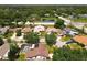 An aerial view featuring neighborhood homes near a highway at 10018 Chesham Dr, Orlando, FL 32817