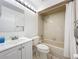 Bright bathroom with a tub, vanity, and modern fixtures, creating a clean and functional space at 10018 Chesham Dr, Orlando, FL 32817