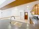 Well-lit kitchen with granite countertops, stainless steel appliances, and a view into the dining area at 10018 Chesham Dr, Orlando, FL 32817