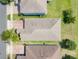 Aerial view of home showcasing the roof, landscaping, and nearby homes in the neighborhood at 10091 Lovegrass Ln, Orlando, FL 32832