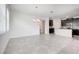 Bright dining space featuring tile floors, seamlessly connecting to the kitchen for easy entertaining at 10091 Lovegrass Ln, Orlando, FL 32832
