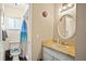 Bathroom featuring a round mirror, marbled countertops, a toilet, and a shower with an ocean-themed curtain at 109 Woodfield Ct, Sanford, FL 32773