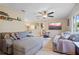 Comfortable living room with neutral tones, stylish furnishings, and a ceiling fan at 109 Woodfield Ct, Sanford, FL 32773