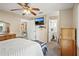 Spacious main bedroom featuring easy access to a dining area, closet, and attached bathroom at 109 Woodfield Ct, Sanford, FL 32773