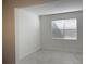 This room features neutral paint and natural light from the window at 11070 Longleaf Woods Dr, Orlando, FL 32832