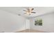 Neutral bedroom with a ceiling fan, carpeted floor, and natural light from a window at 12 Horseman Cv, Longwood, FL 32750