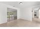 Open-concept living room with tile flooring and a seamless transition to other living spaces at 12 Horseman Cv, Longwood, FL 32750