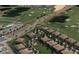Aerial view of residential neighborhood with golf course and ponds nearby at 1269 Long Cove Loop # 1269, Davenport, FL 33896