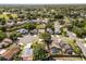 Aerial view of community featuring mature trees, many residences, and plenty of greenery at 1346 Palo Alto Ct, Winter Springs, FL 32708