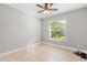 Bedroom featuring tile flooring, a ceiling fan, and bright window with blinds at 1346 Palo Alto Ct, Winter Springs, FL 32708